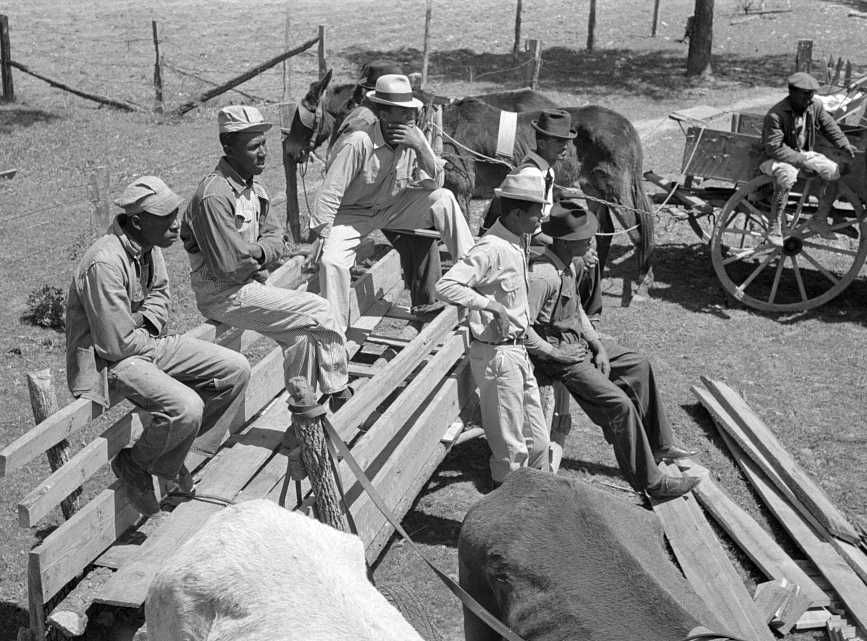 Group of FSA (Farm Security Administration) clients listening to speaker on project near Marshall, Texas. Sabine Farms, Texas - Photo: Russell Lee