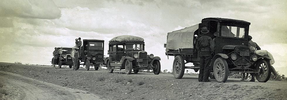 Three related drought refugee families stalled on the highway near Lordsburg, New Mexico.  Photo: Dorothea Lange