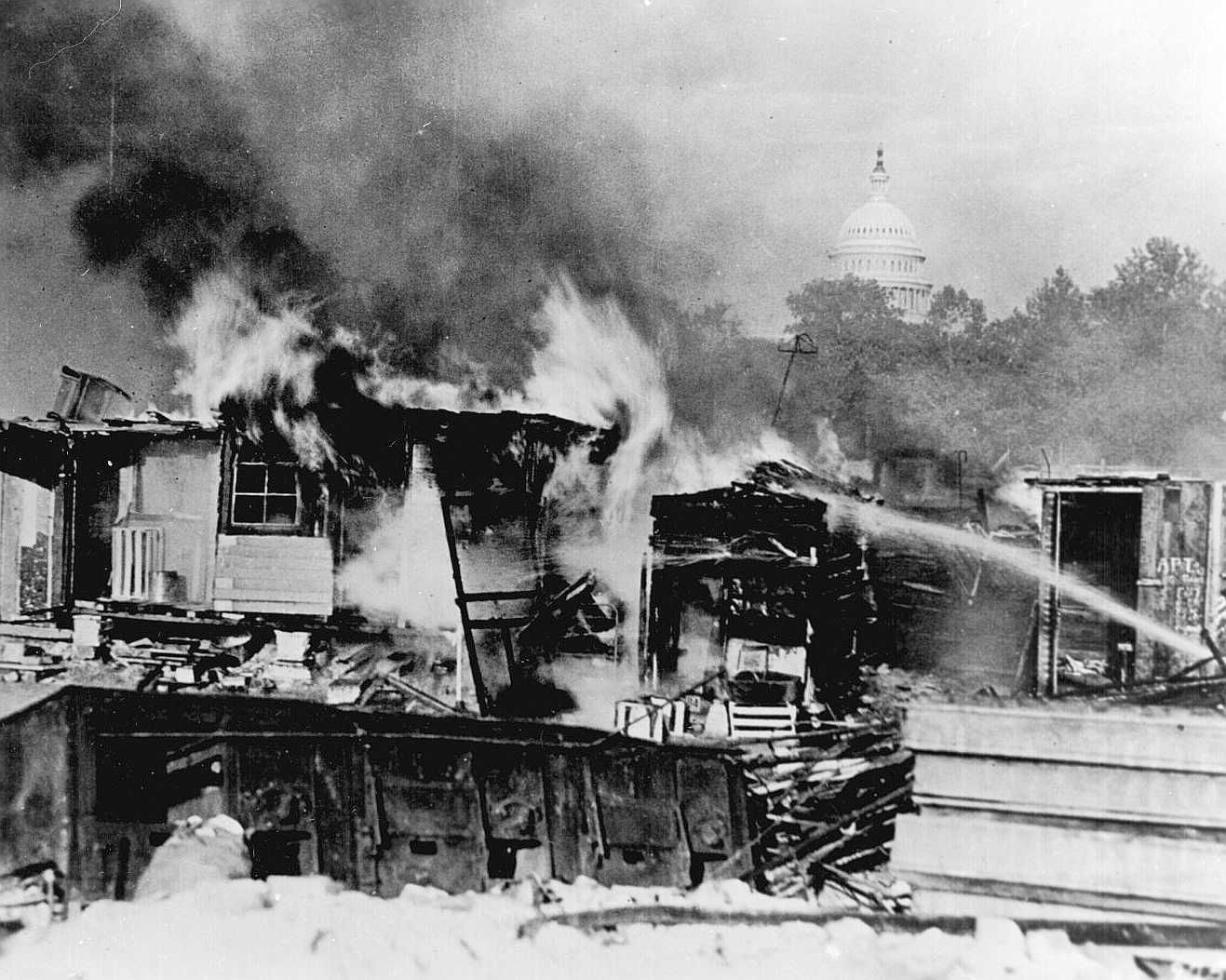 Shacks that members of the Bonus Army erected on the Anacostia Flats burning after the confrontation with the military. Photo: Signal Corps/National Artchives